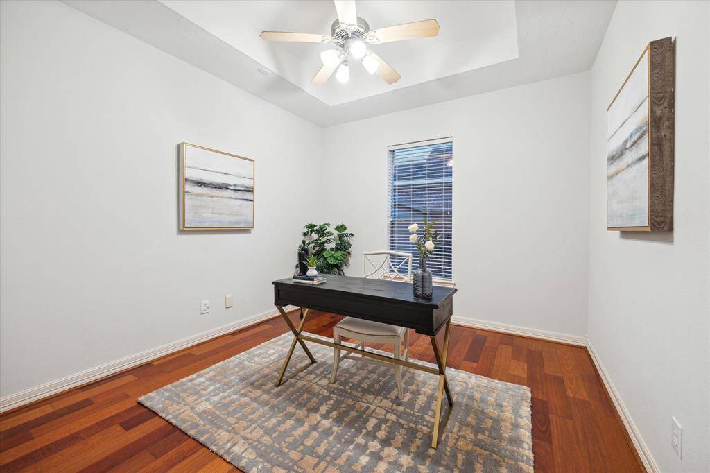Tucked away near the front of the home, the private study offers a peaceful escape from the rest of the living spaces.