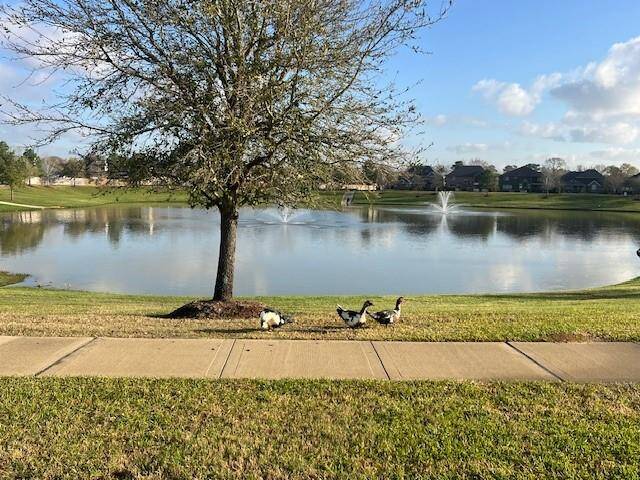 Serene community lake with scenic views and tranquil surroundings.
