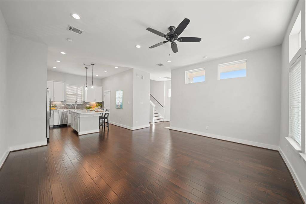 Space for a dining area sits just between the living room & kitchen.