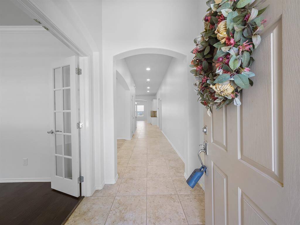 Step inside and be greeted by a freshly painted interior, radiating tranquility and creating a warm, inviting atmosphere.