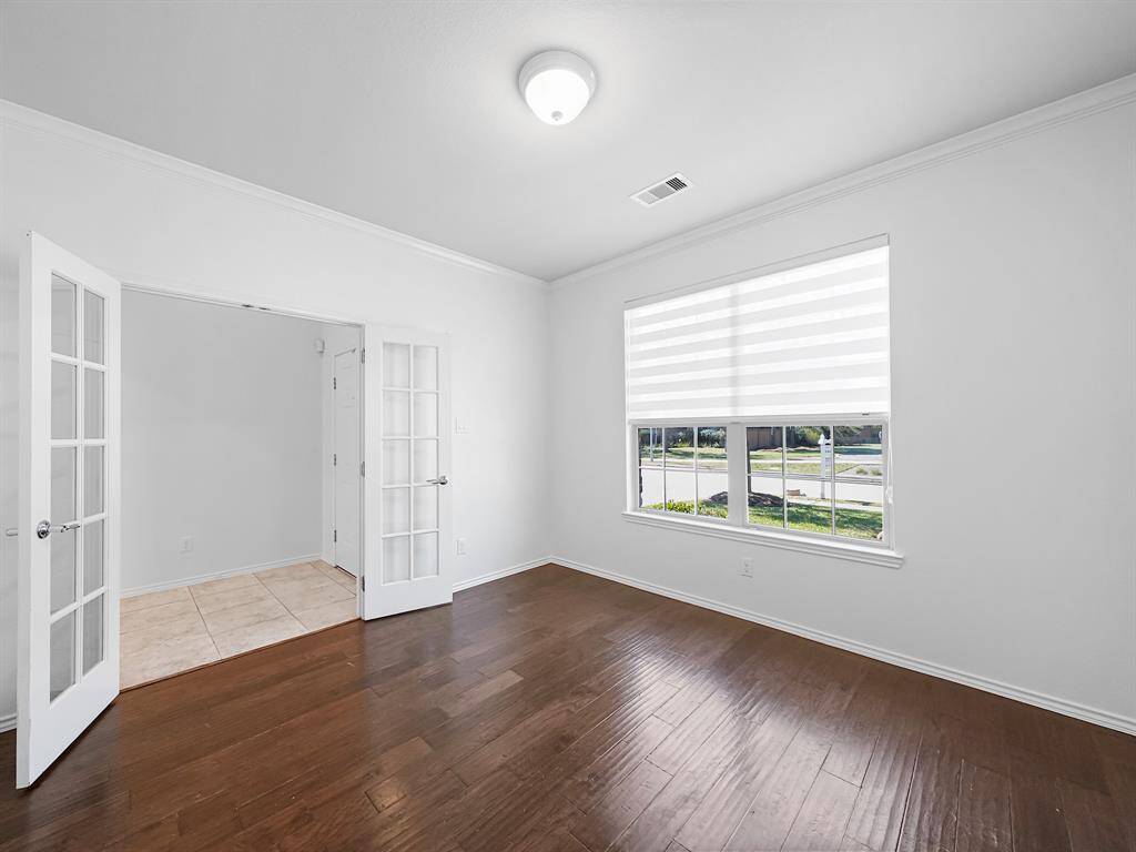 o the left of the entrance, you'll find a private study, ideal for working from home or pursuing personal projects. The French door entry adds a touch of sophistication and privacy, allowing you to focus without distractions.
