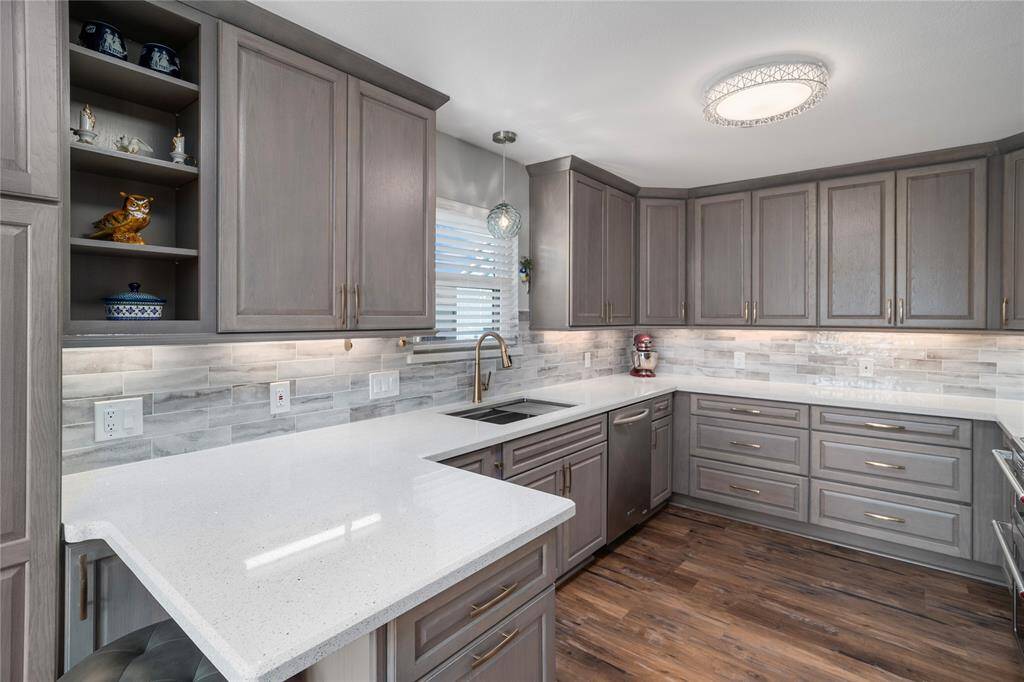 This stunning kitchen renovation was completed in 2023.  Soft-close doors and drawers; under-cabinet lighting, quartz counters. Storage galore!