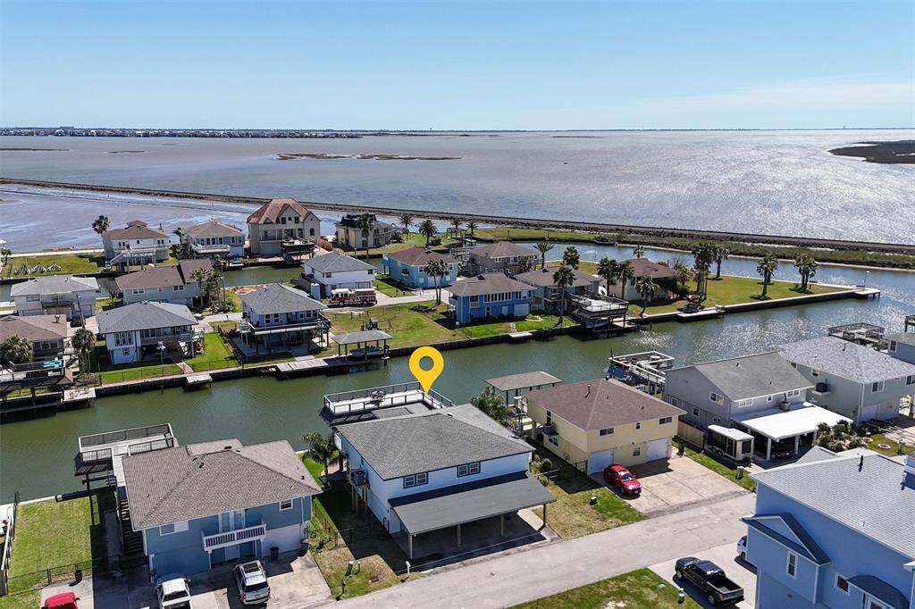 Has an oversized boathouse and a three-car carport.