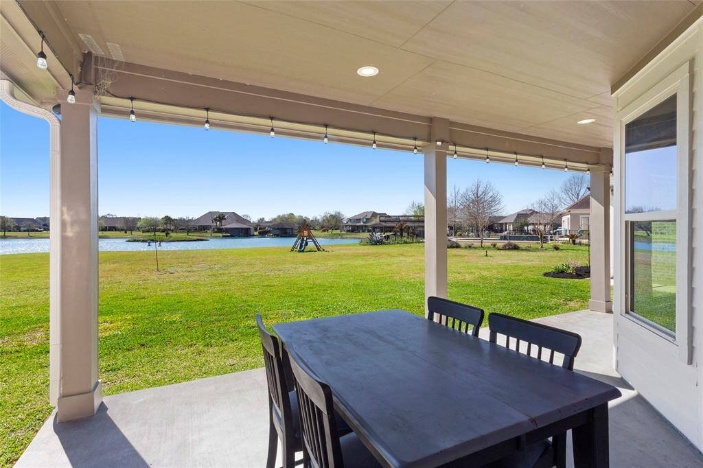 This is a second outdoor patio on the back of the home overlooking the lake.