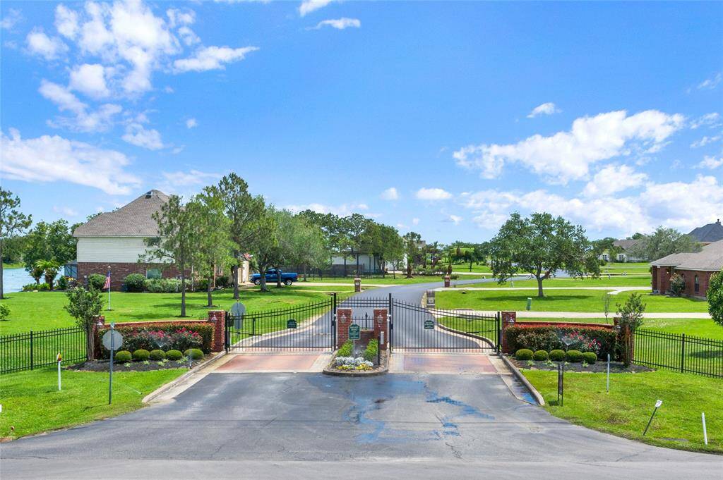 Lago Santa Fe is a gated community.  Each resident is issued clickers that allow entry.