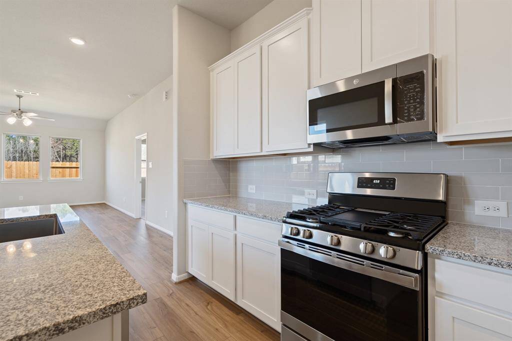 This kitchen is not only a functional space but also has ample storage. Whether you're a seasoned chef or just love to gather and enjoy good food, this kitchen is a dream come true.