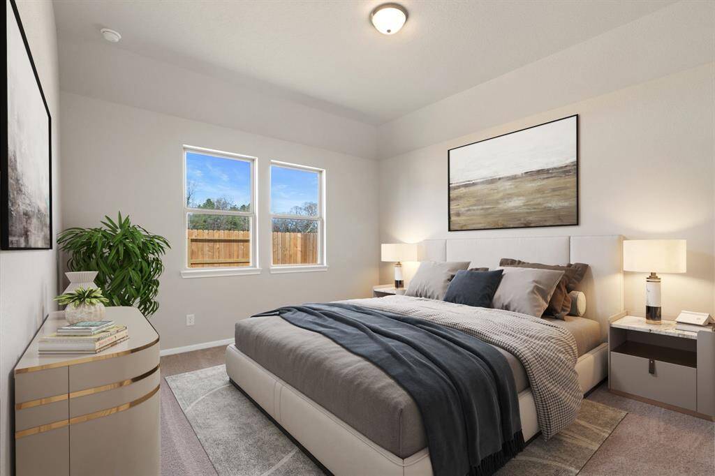 The primary bedroom is generously sized, creating a tranquil and spacious retreat that offers ample room for relaxation. Featuring plush carpet, high ceilings, fresh paint, and large windows that lets in natural lighting throughout the day. Photo is virtually staged