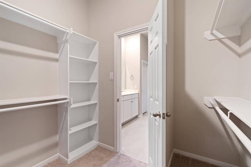 A view of your large primary walk-in Closet