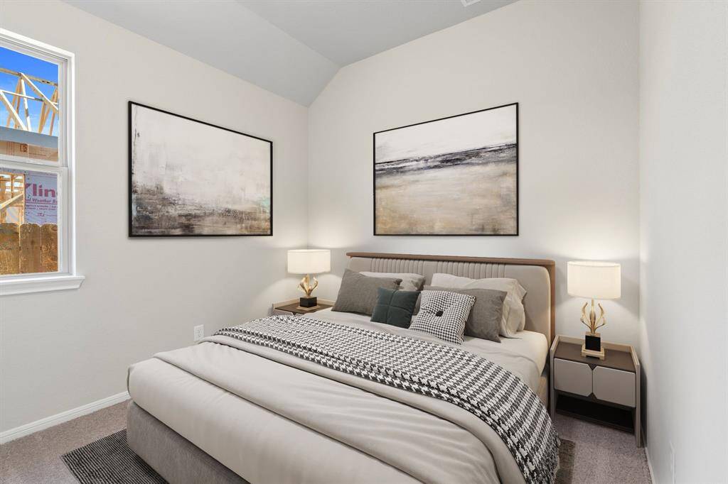Your secondary bedroom features plush carpet, fresh paint, closet, and a large window that lets in plenty of natural lighting. Photo is virtually staged
