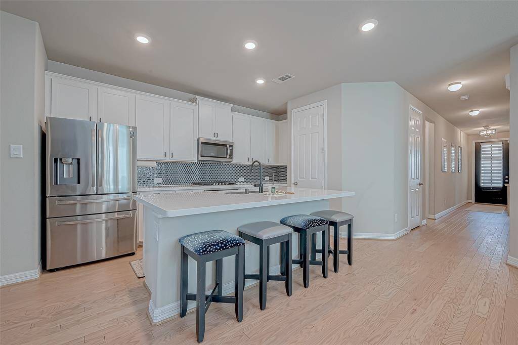 Quartz Countertops and beautiful backsplash