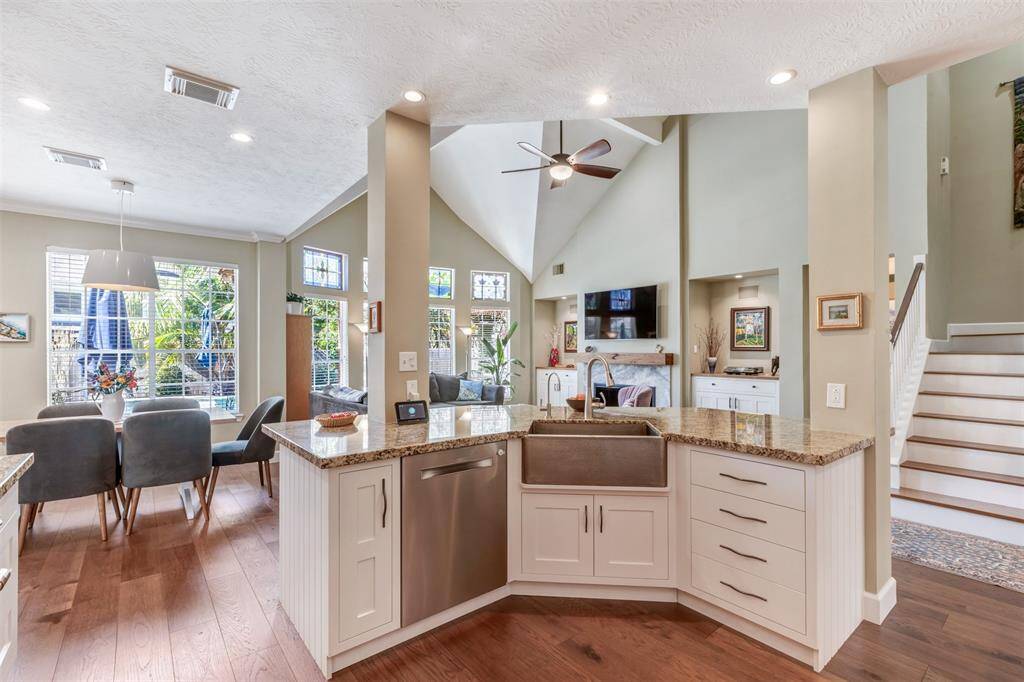 These beautiful white high quality cabinets will never go out of style. Updated appliances, hammered sink, and pretty pulls make it a pleasure to cook in.