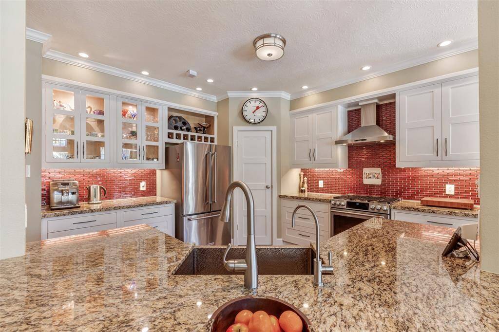 The one level island is a great spot to prepare food, eat meals, or for kids to do homework.