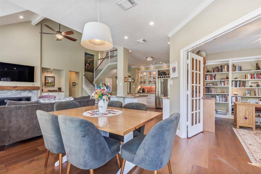 To the right of the breakfast area is the second home office. This room is currently being used as an home office. It's a flex room, it could be a den, playroom, or exercise room. Whatever you desire. Beautiful French doors provide privacy.