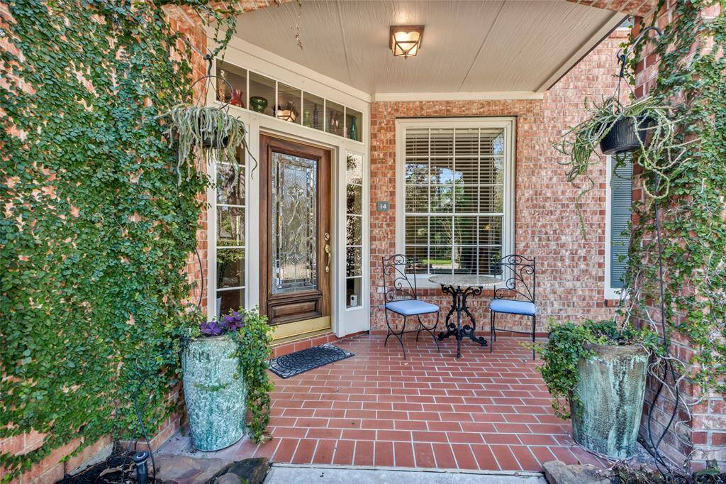 A welcoming bricked front porch welcomes you to the home.