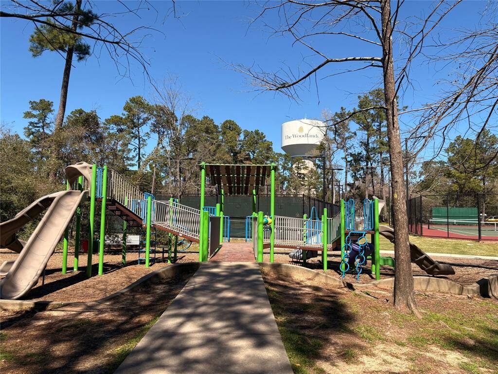 There are several areas that have playground equipment. On the other side of the playground equipment is the tennis and pickle ball courts.