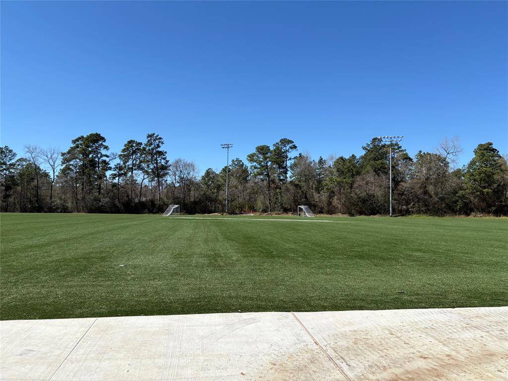 There's a large grassy area that can be used for open play.