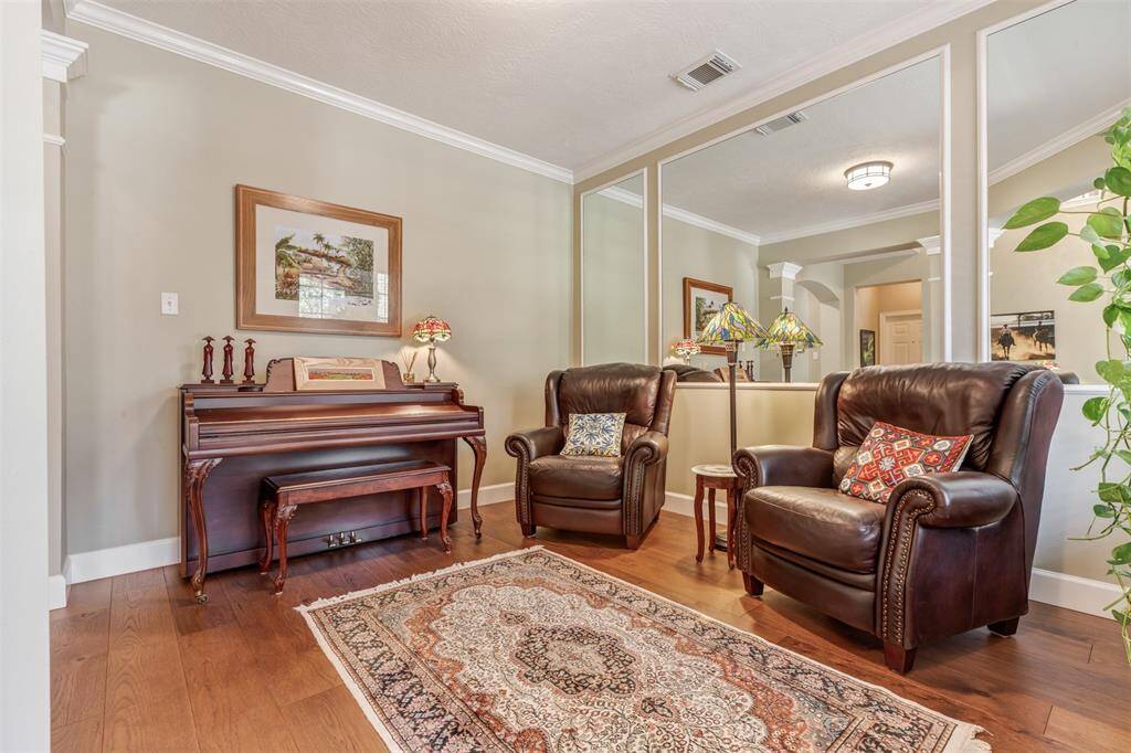 This large open room is light and bright with a pretty neutral paint.
