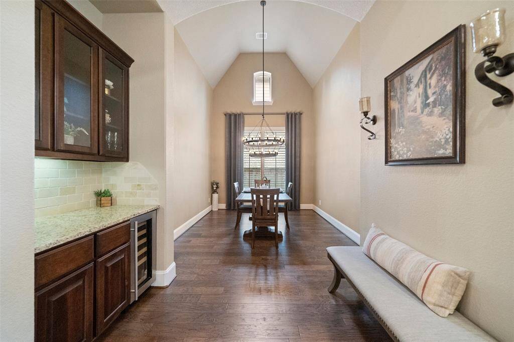 High ceilings & a gorgeous chandelier make a dramatic setting.