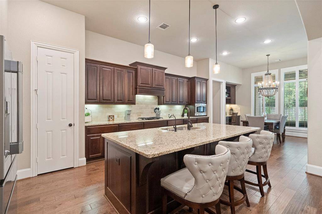 Huge Chef's kitchen opens to the massive room