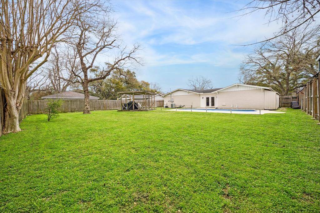 Over 13,000 sq ft lot!  The possibilities are endless.