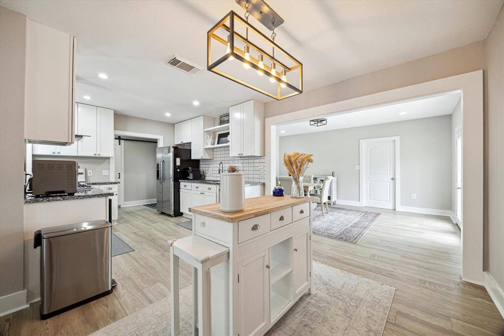 View of the flexible space that could easily be used as a breakfast/dining area.