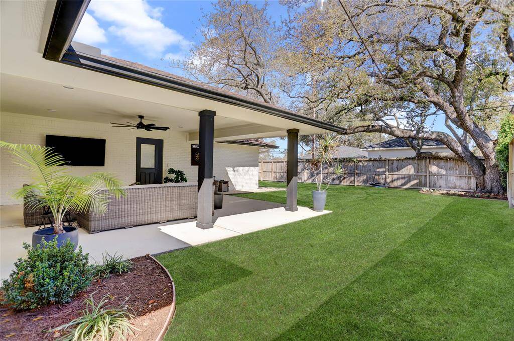 View of the yard and patio from the East side of the property.