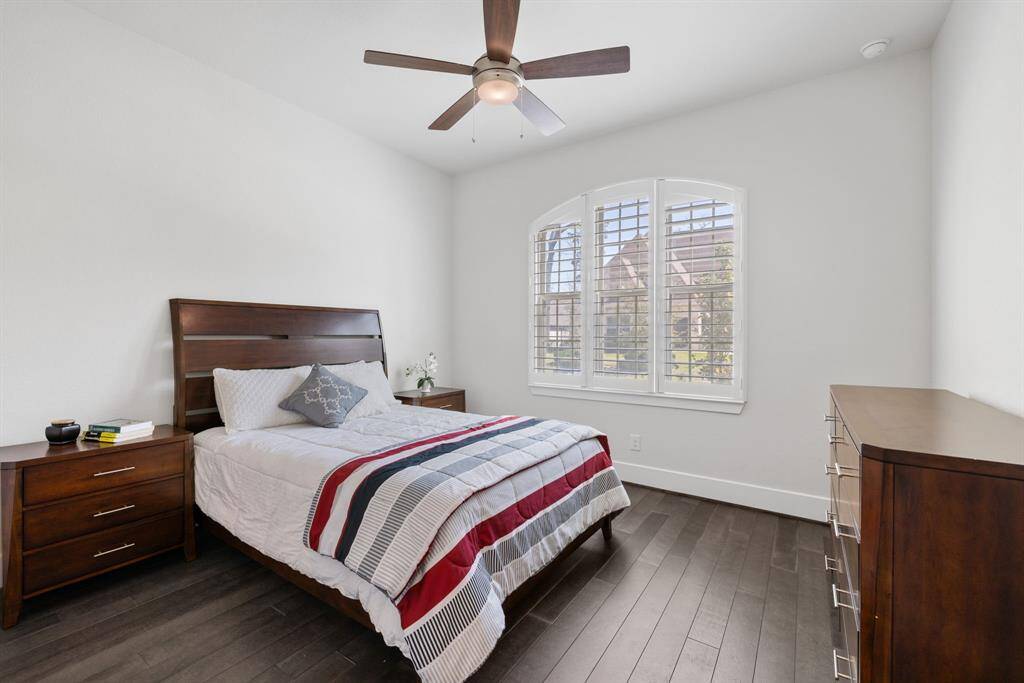 Highly desired first floor guest bedroom at front of house with full bathroom.