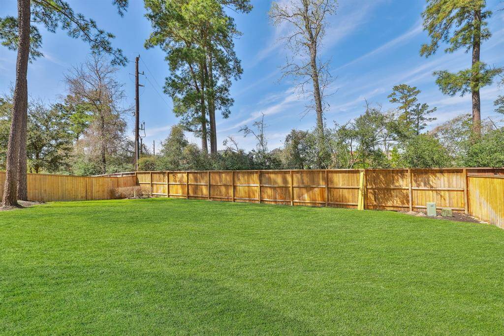 Oversized lot with no rear neighbors. Fenced back yard.