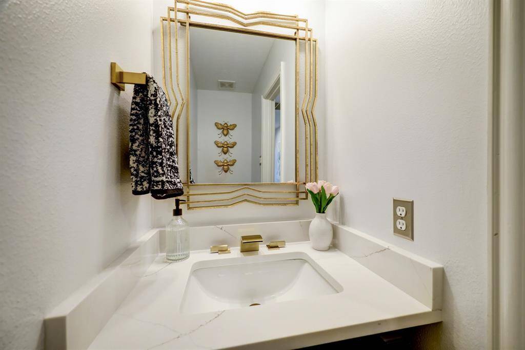This totally updated powder room is perfectly situated on the first floor for guests and near the home/office