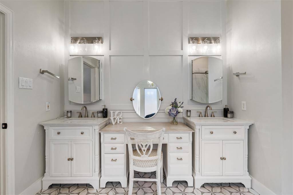 Soaking tub, separate shower, updated tile floors, upgraded lighting and more.