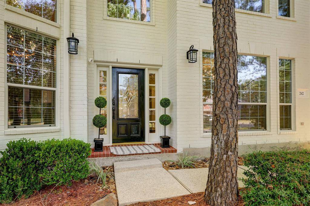 The front walk exudes charm and elegance.