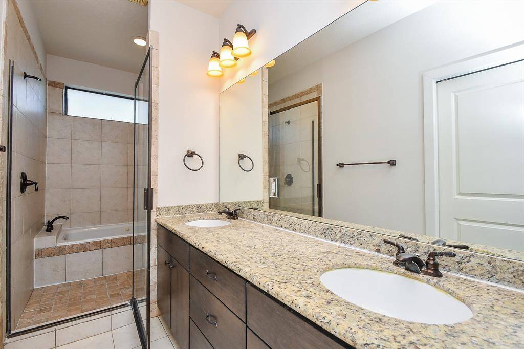 Dual Sinks + Separate Tub & Shower in the primary bathroom