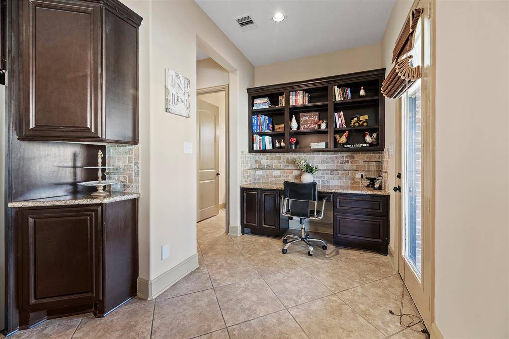 An additional desk area with coordinating counter and cabinet space is added for your convenience.