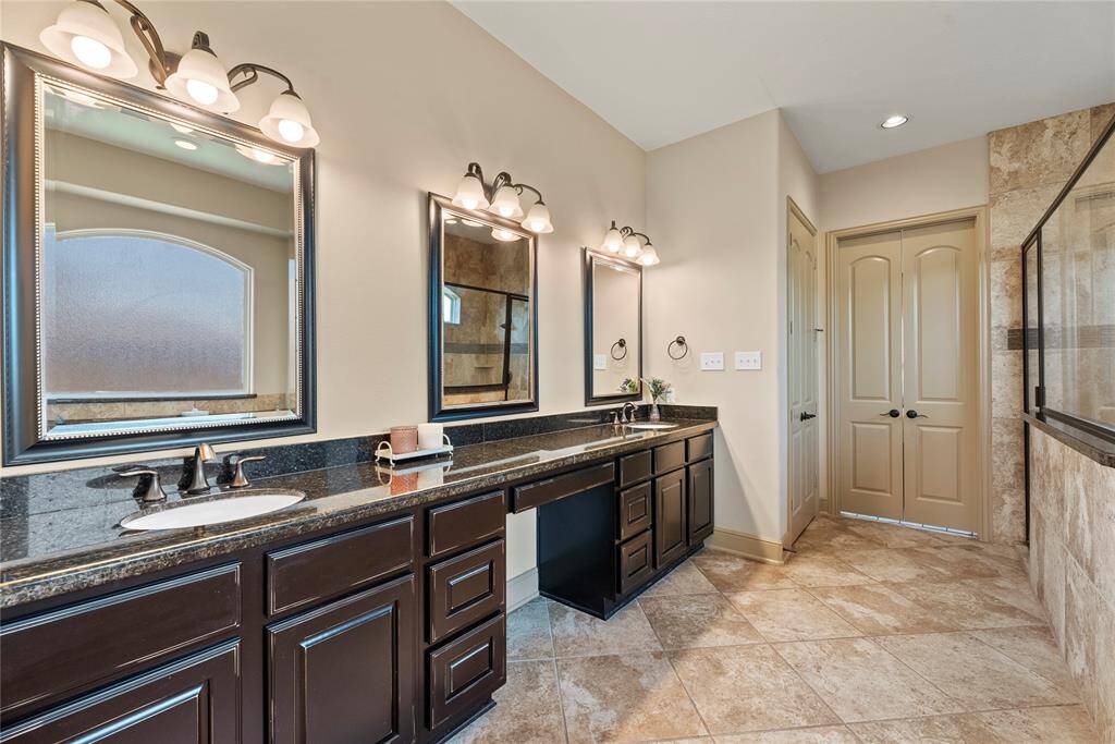 Dual vanities in your primary bath, offer personal space with tons of dedicated cabinet space.