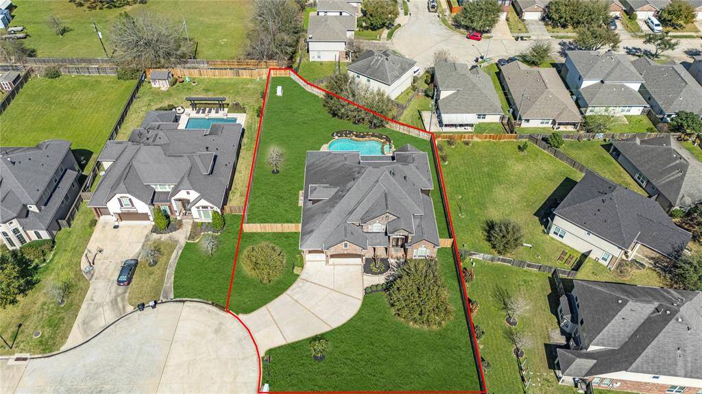 This aerial view showcases the prime location on a quiet 1/2 acre cul-de-sac lot!