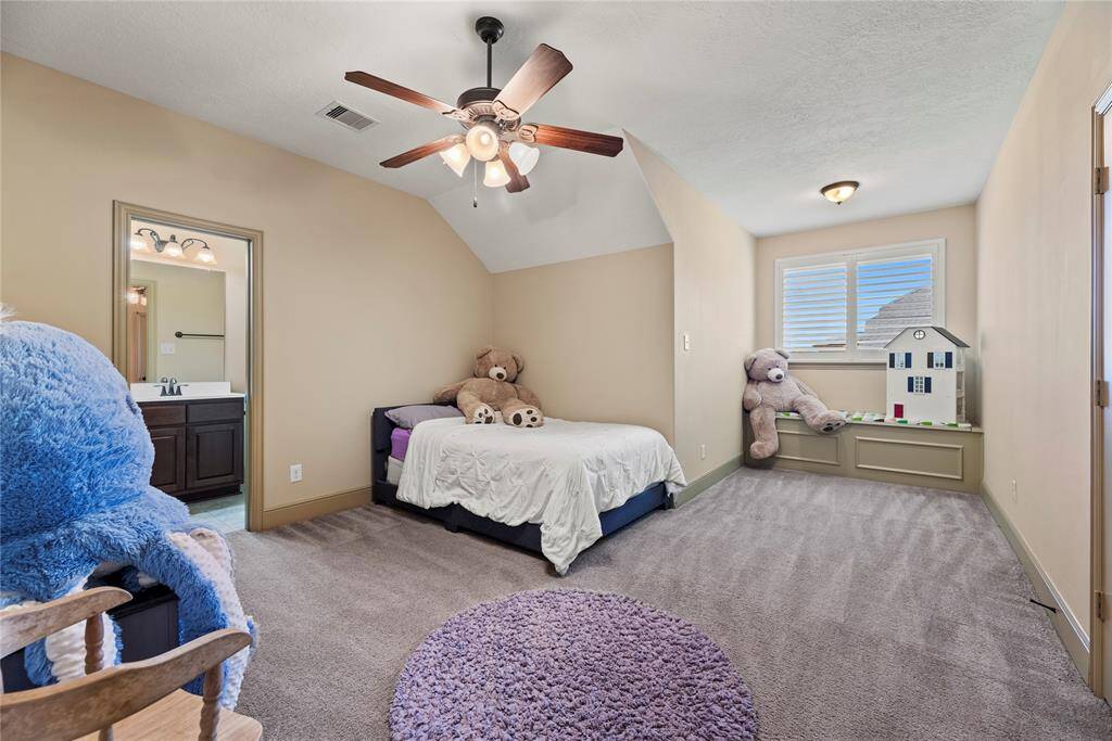 Your fourth bedroom offers a generous and inviting space that exudes comfort and versatility, with private en-suite bath.