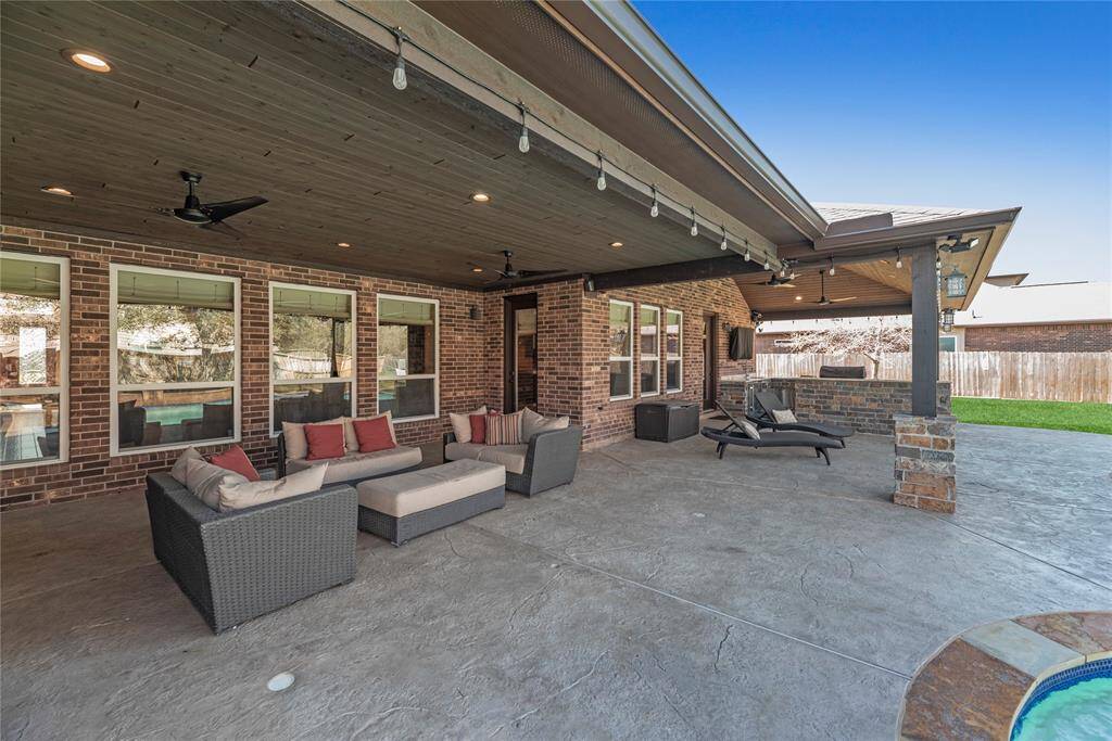 The patio with outdoor kitchen is a great place to barbecue for family and friends. Can you picture yourself sitting back and just enjoying space? It's so calming.