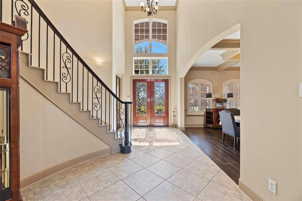 Whether it's for guests arriving for the first time or for the homeowners returning at the end of the day, stepping through this doorway is sure to evoke a sense of pride and joy.