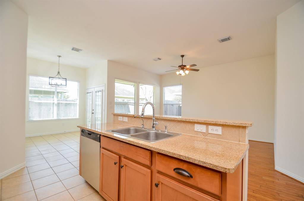 View of family and Breakfast from Kitchen
