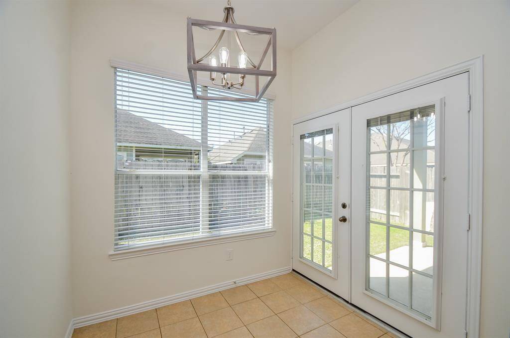 Breakfast with french doors to patio
