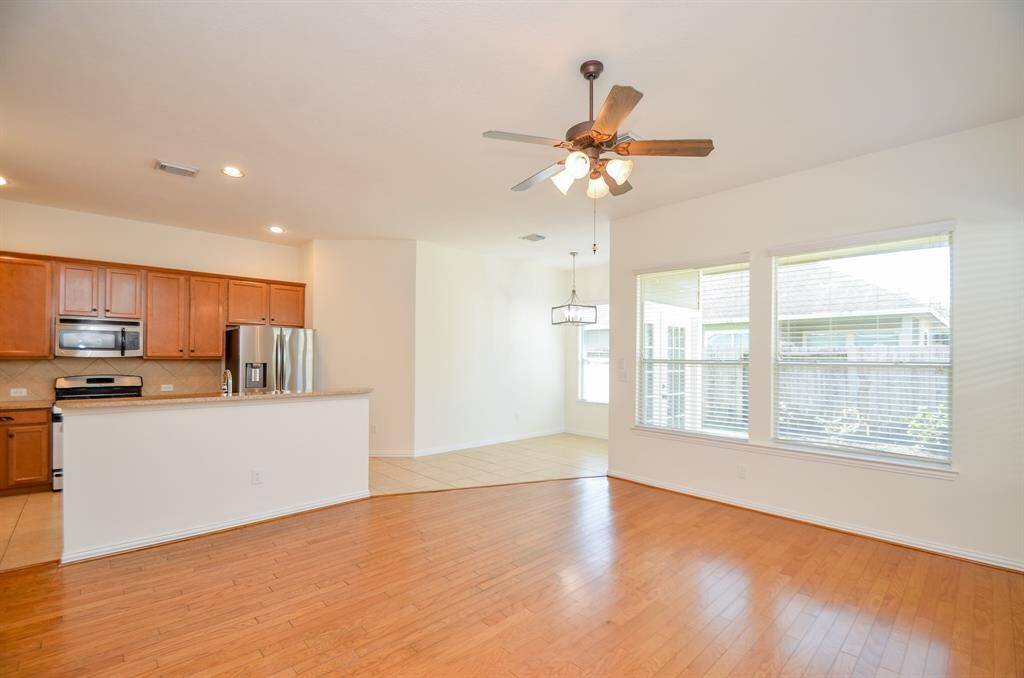 Family, Breakfast and Kitchen, notice the beautiful hardwood floors!