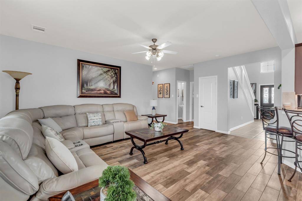 The electric sectional has 3 reclining seats and is optional for the buyer to convey with the sale of the home.