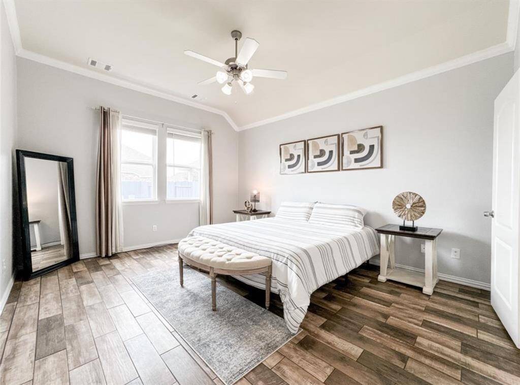 Another angle of the primary bedroom, custom flooring.