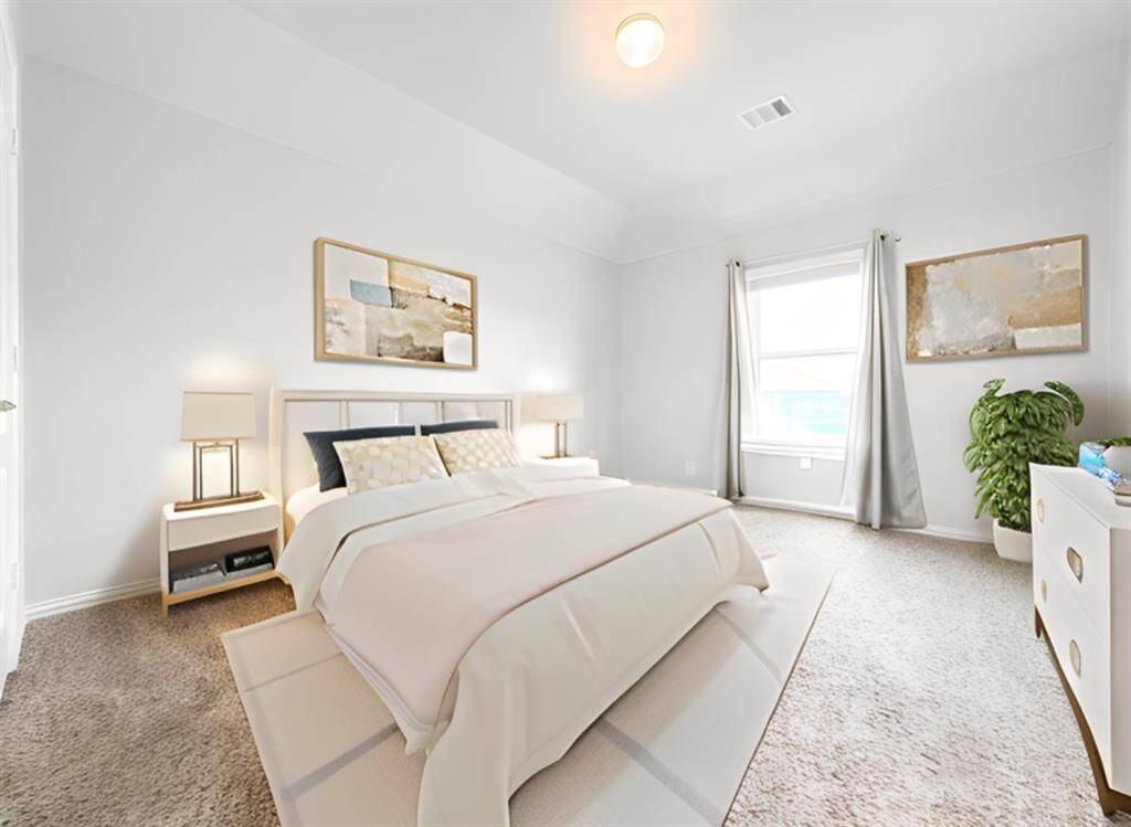 Bedroom two, located upstairs.