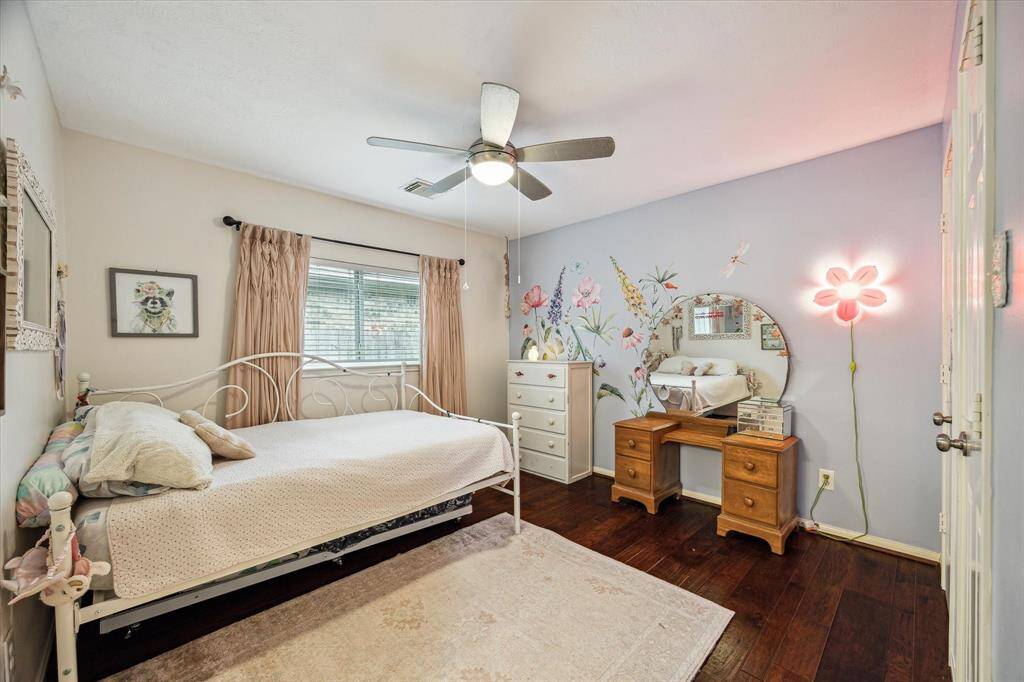 Another view of a 1st floor secondary bedroom with great natural light.