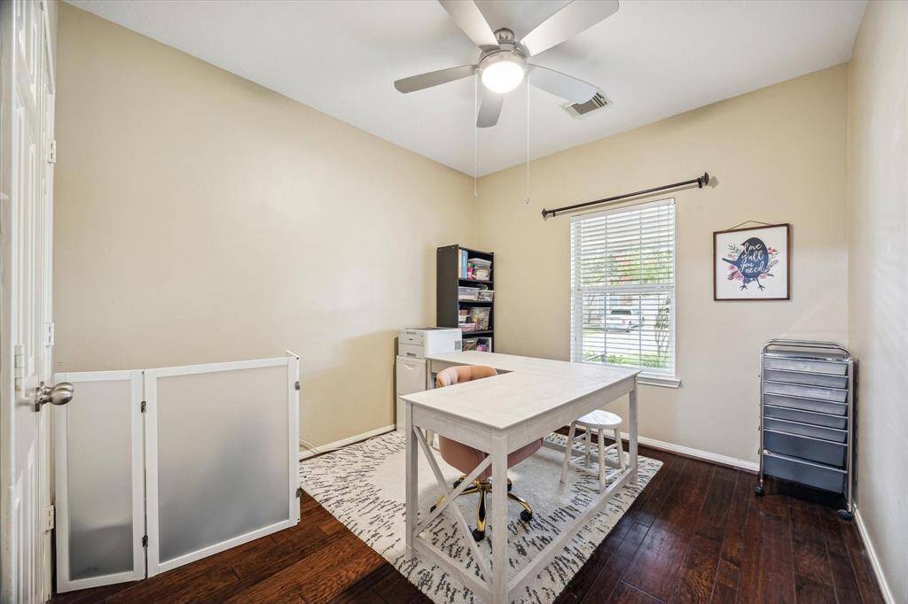 1st floor secondary bedroom now being used as an office.  This room faces the front of the home.