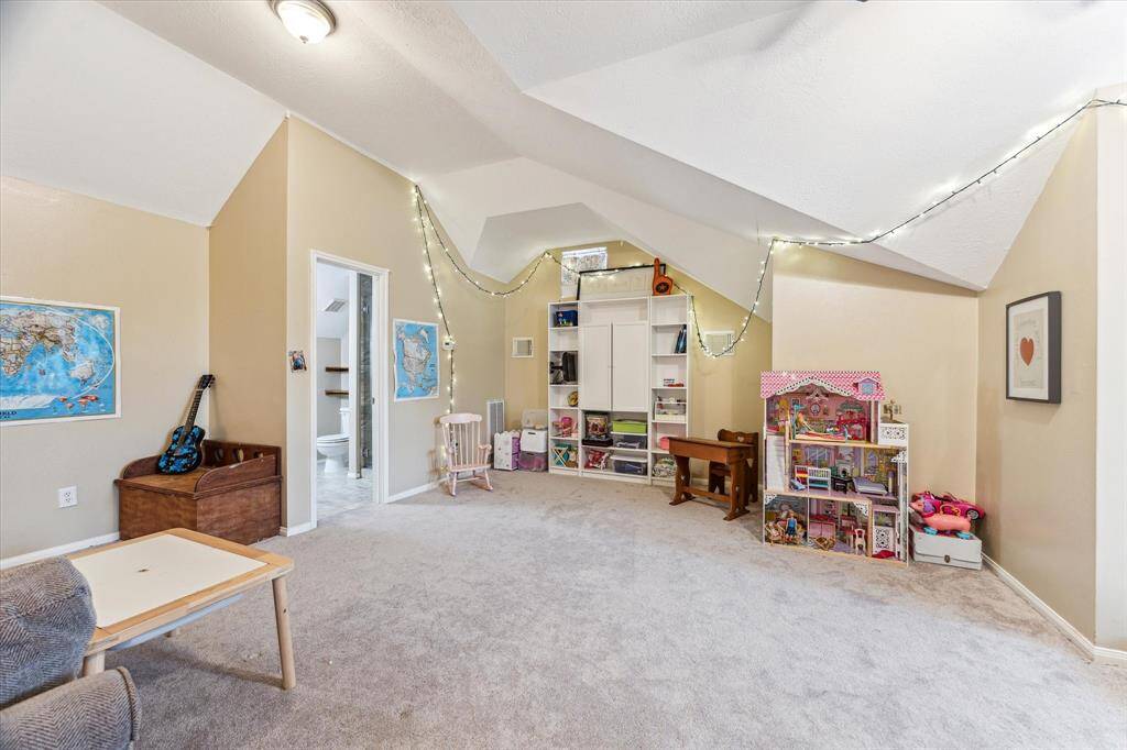 To the back of the large 2nd floor bonus room is its own private bath.  Don't miss the previous picture that shows how unbelievably large this room really is.