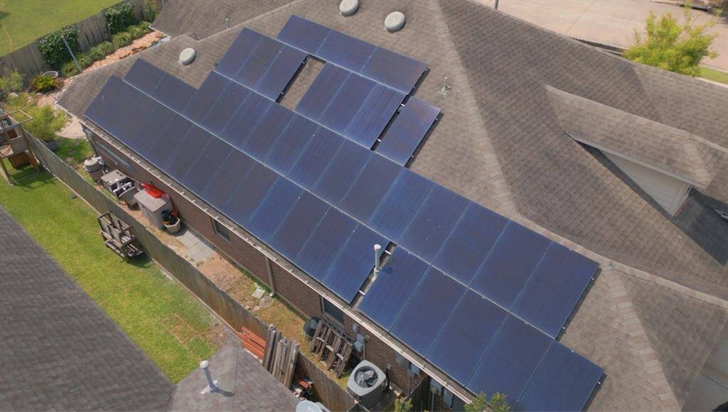 Solar panels on the side of home. Not visible from the front of the house from the street.
