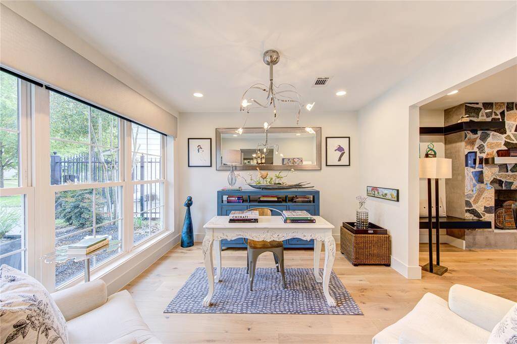 The sitting room off the dining room is a versatile space that can easily be converted to a home office.