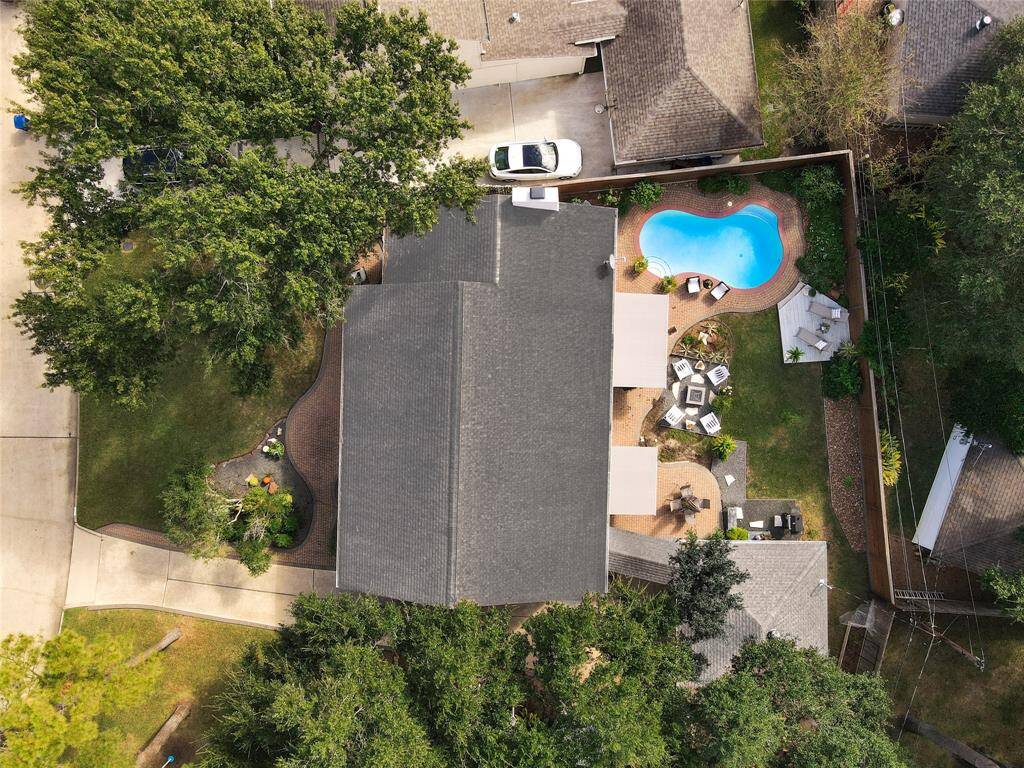 This rare Pie Estate lot boasts a double-wide backyard, offering plenty of room for a pool, green space, and a garden!